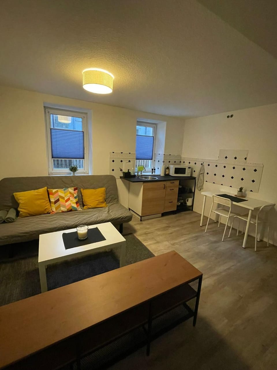 Kitchen or kitchenette, Living room, Seating area, Dining area