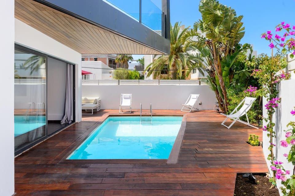 Property building, Living room, Swimming pool