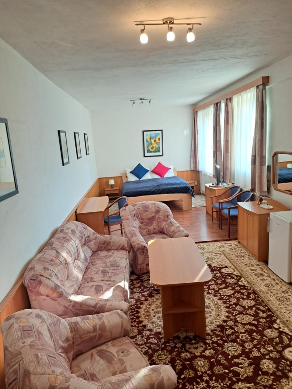 Bed, Living room, Seating area, Bedroom