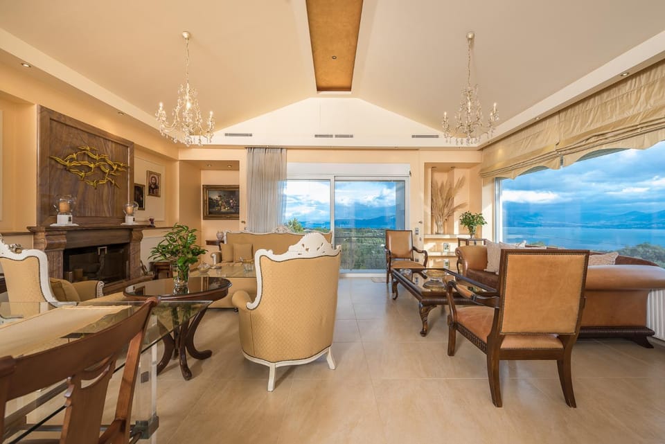 Natural landscape, TV and multimedia, Living room, Seating area, Dining area, Sea view