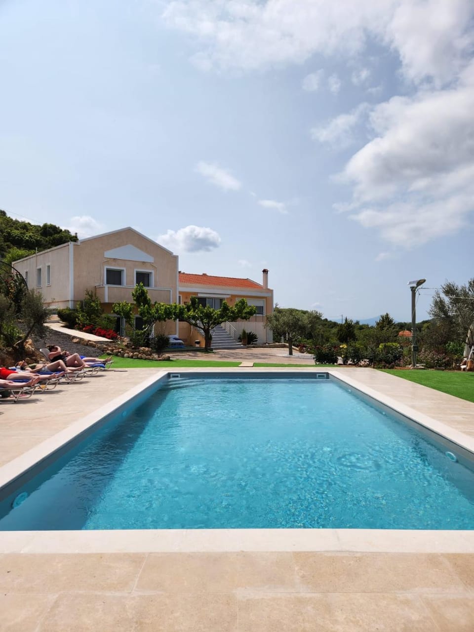 Property building, Natural landscape, Pool view, Swimming pool, sunbed