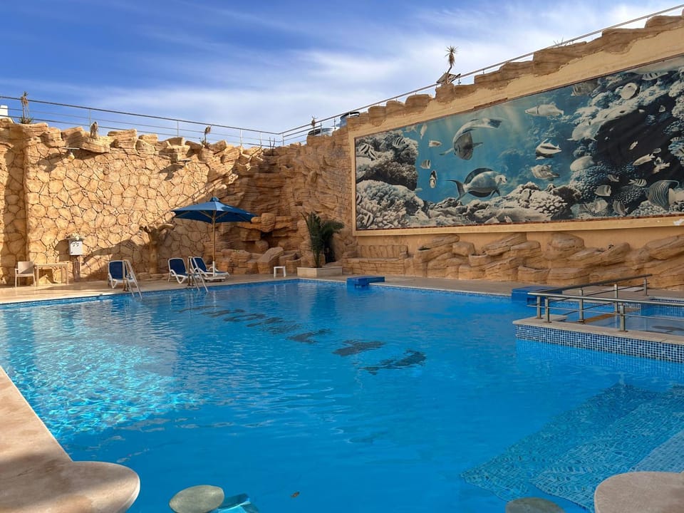 Beautiful 3-Bedroom Apartment on the Ground Floor with Personal Backyard Area and Terrace with Direct Pool Access and Pool View Apartment in Sharm El-Sheikh