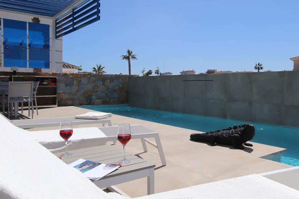 Patio, Pool view, sunbed