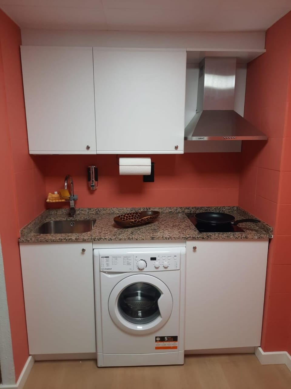 Kitchen or kitchenette, stove, washing machine