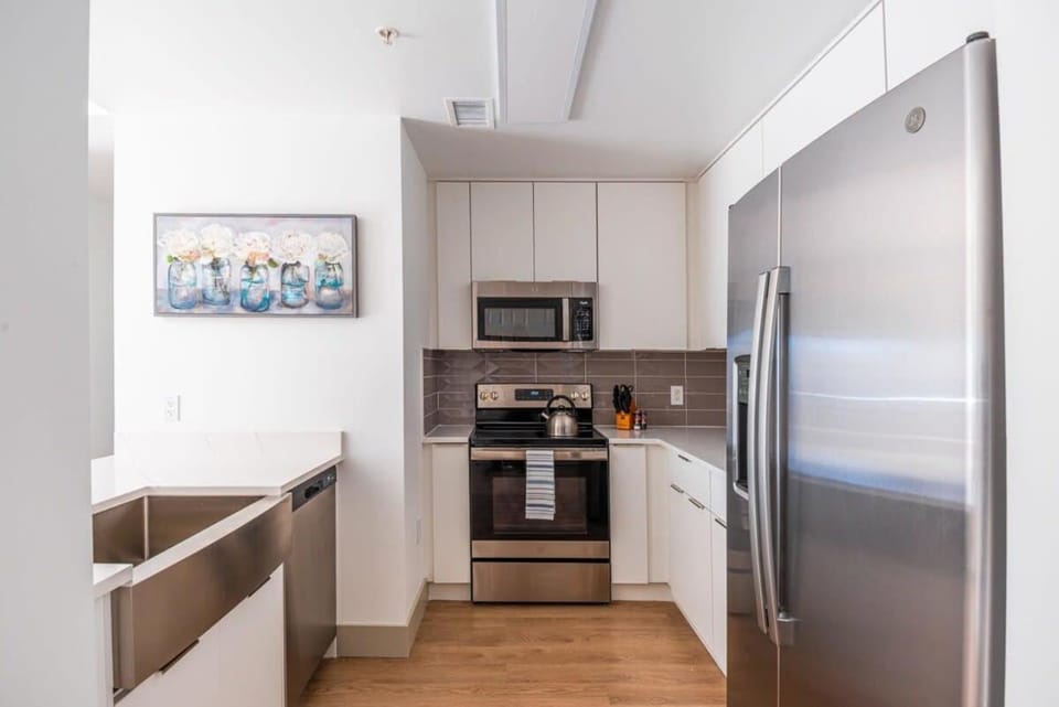 Kitchen or kitchenette, dishwasher, oven, stove, toaster