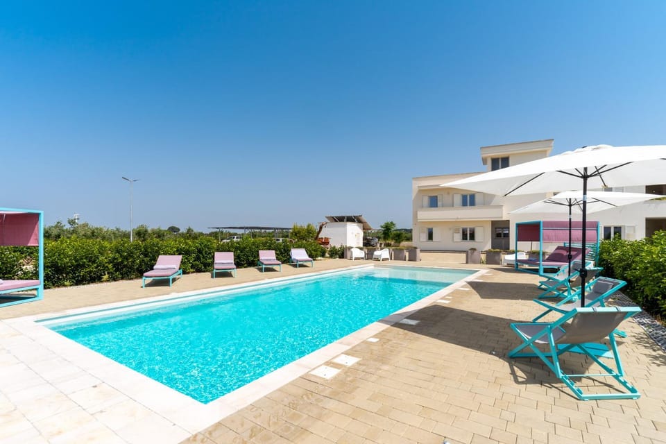 Property building, Living room, Swimming pool