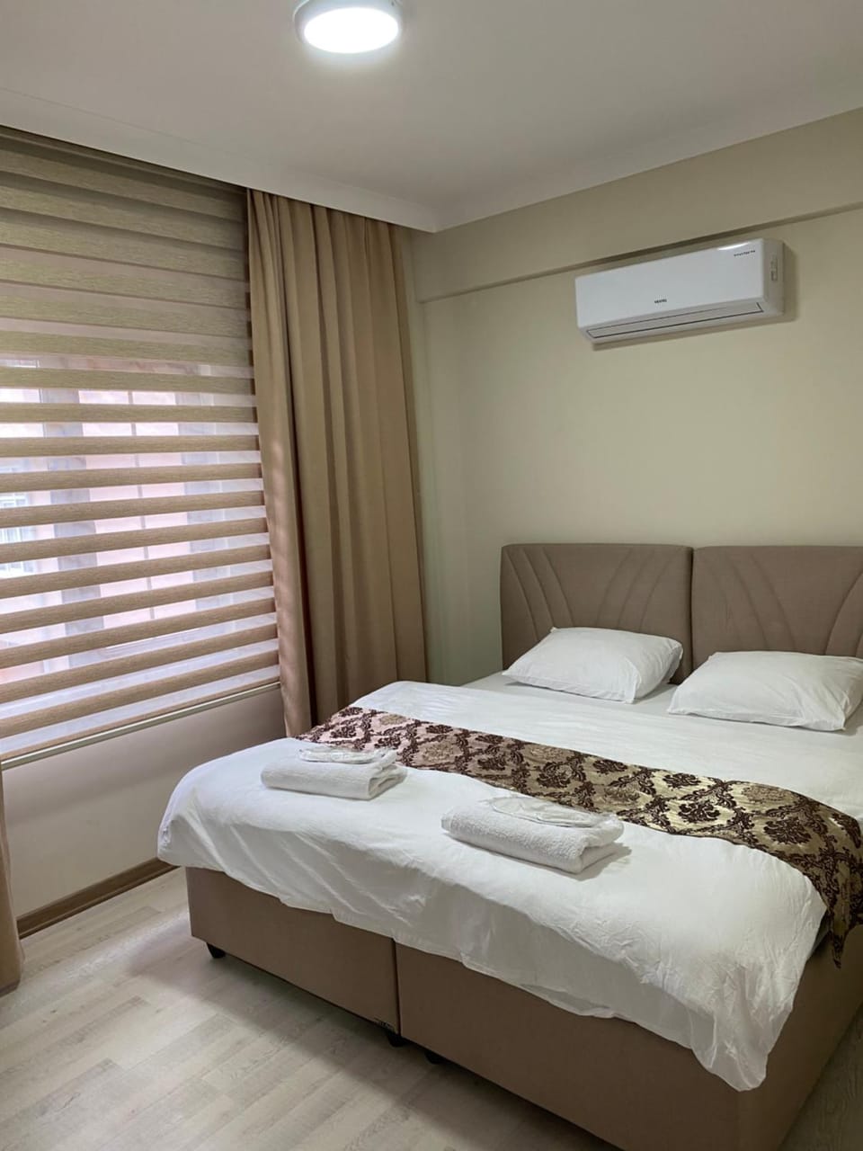 Bed, Photo of the whole room, Bedroom, towels, air conditioner