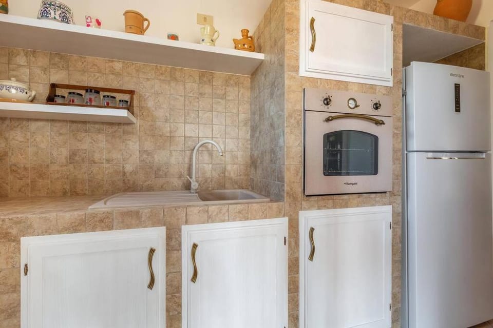 Kitchen or kitchenette, oven, stove