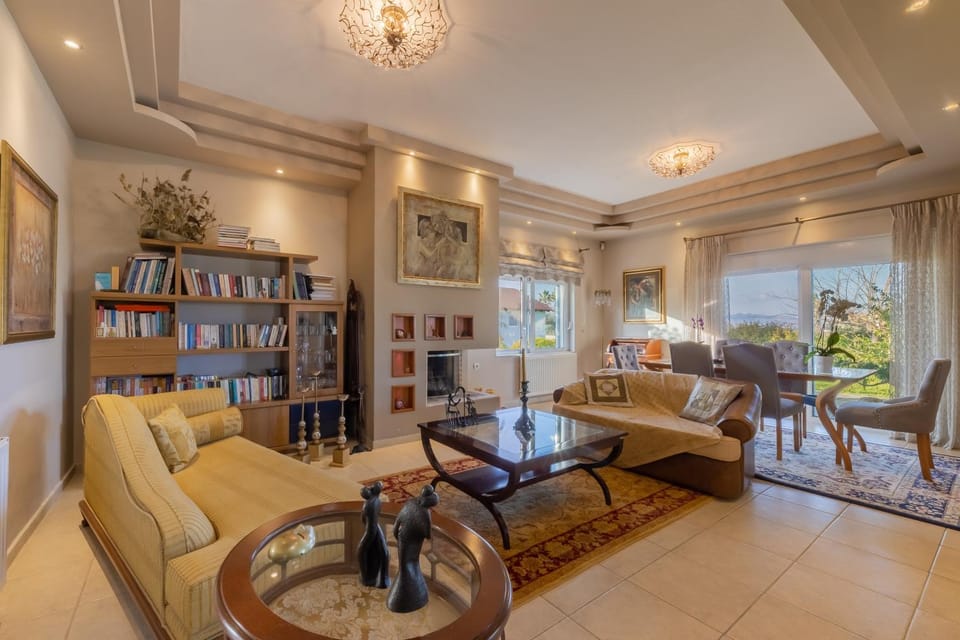 Library, Living room, Seating area, Dining area