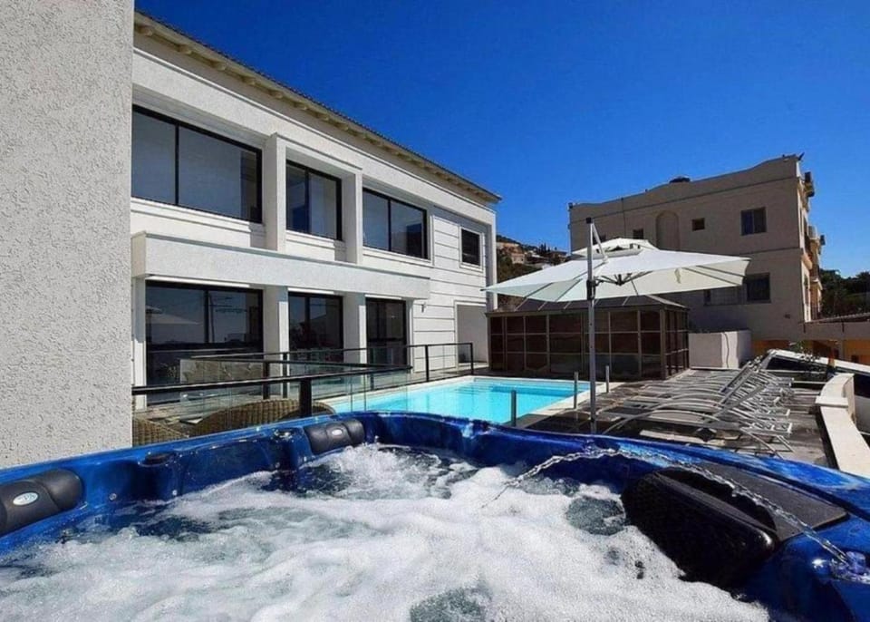 Property building, Day, Natural landscape, Hot Tub, Pool view, Swimming pool, sunbed