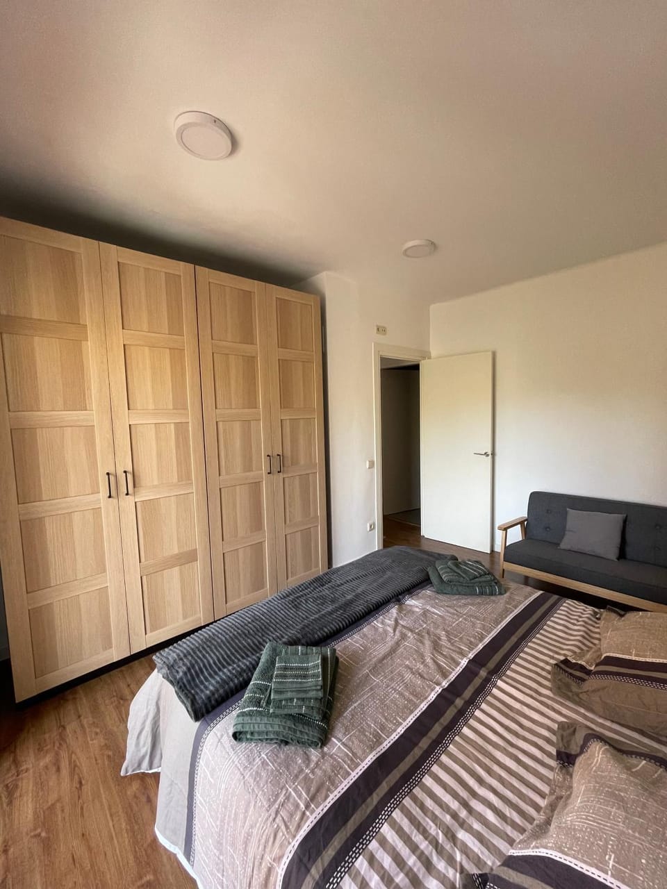 Bed, Photo of the whole room, Bedroom, towels, wardrobe