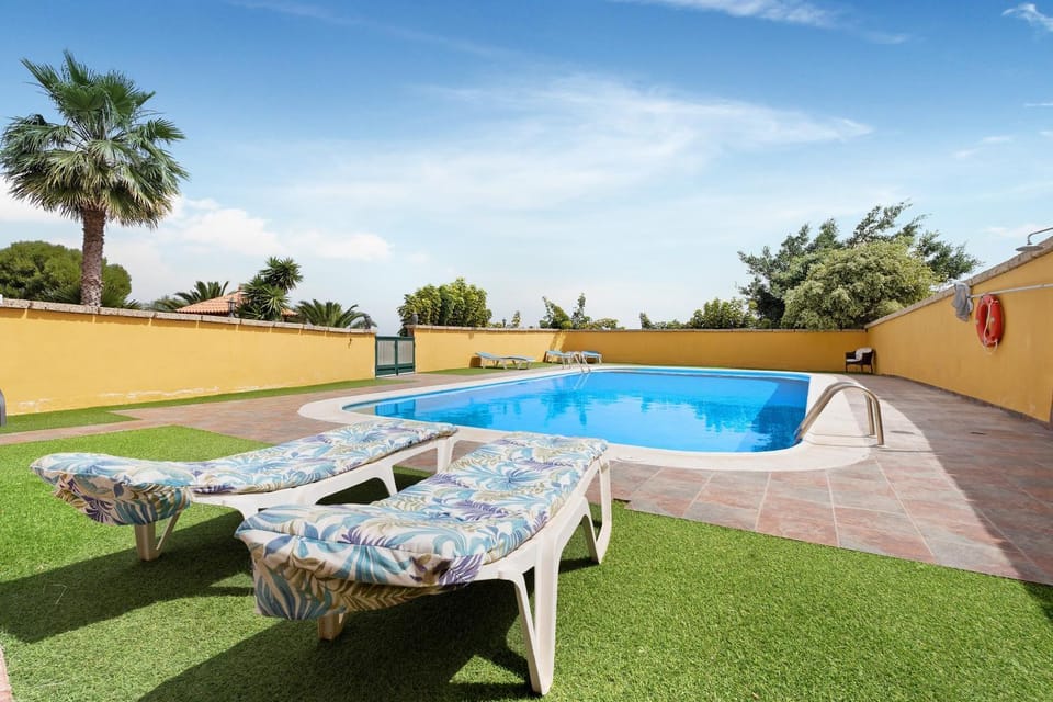 Property building, Living room, Swimming pool