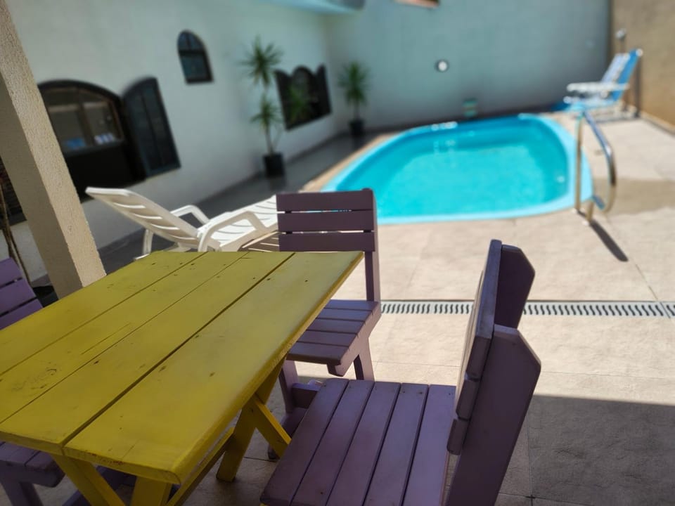 Patio, Seating area, Dining area, Pool view, Swimming pool, sunbed