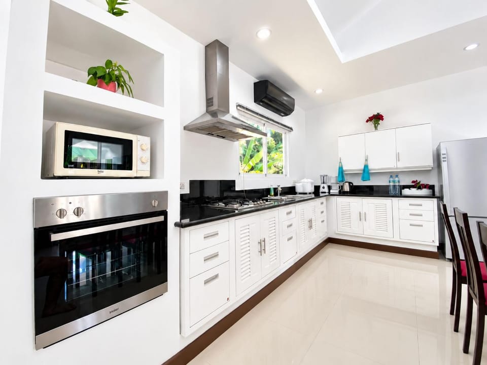 microwave, oven, stove, kitchen, air conditioner