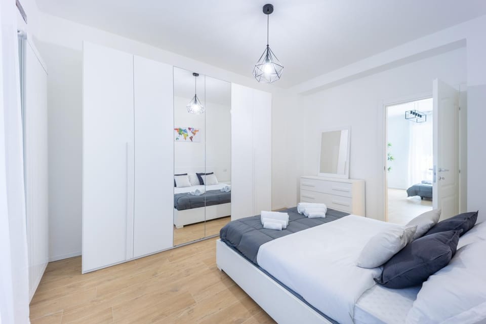 Bed, Living room, Photo of the whole room, Seating area, Bedroom, towels, wardrobe