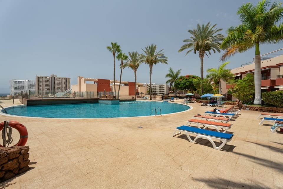 Property building, Living room, Swimming pool