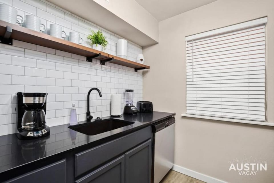 Walk to Restaurants or Cook in Subway Tile Kitchen Apartment in Austin