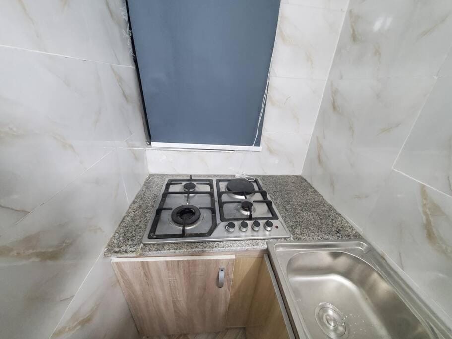 Kitchen or kitchenette, stove
