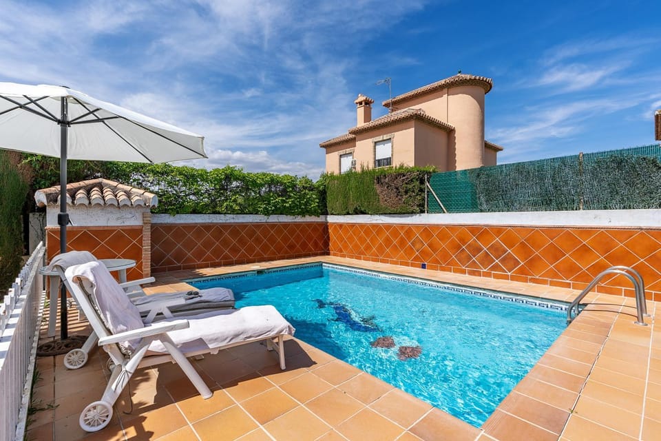 Property building, Living room, Swimming pool