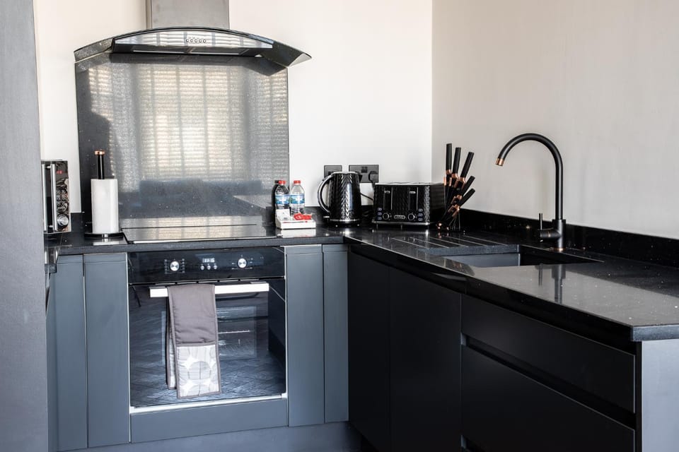 Kitchen or kitchenette, oven, stove