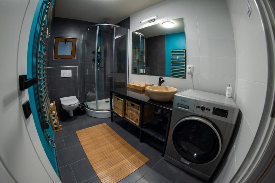 Shower, Toilet, Bathroom, towels, washing machine, dryer