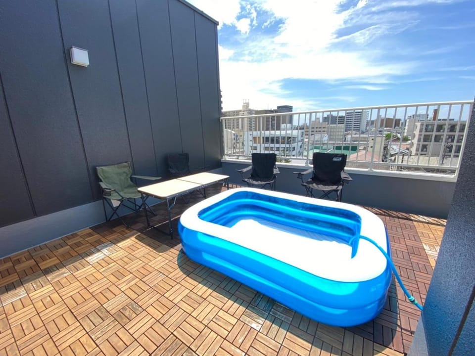 View (from property/room), Balcony/Terrace, City view, Pool view, Swimming pool