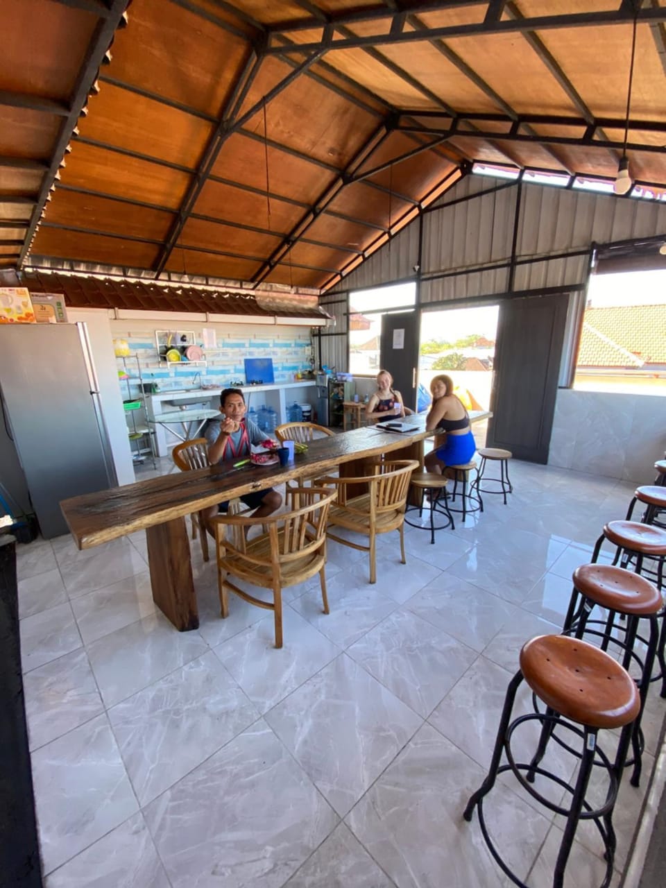 People, Balcony/Terrace, Kitchen or kitchenette, Seating area, group of guests