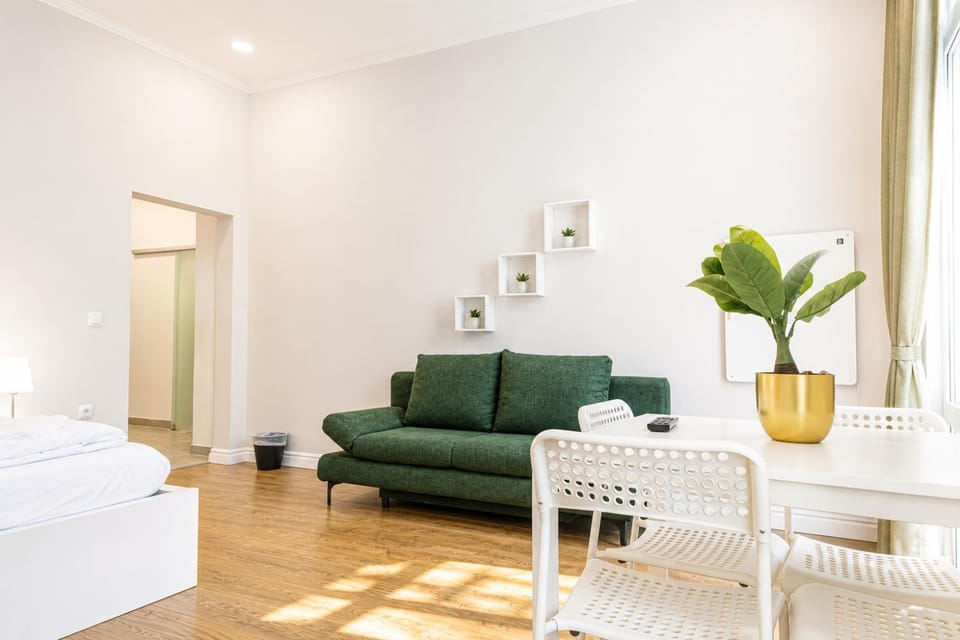 Property building, Bed, Seating area, Bedroom