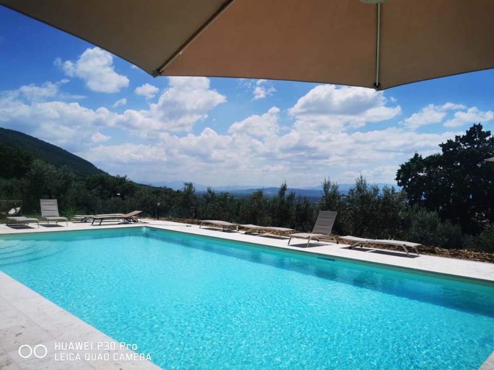 Day, Natural landscape, Swimming pool, sunbed