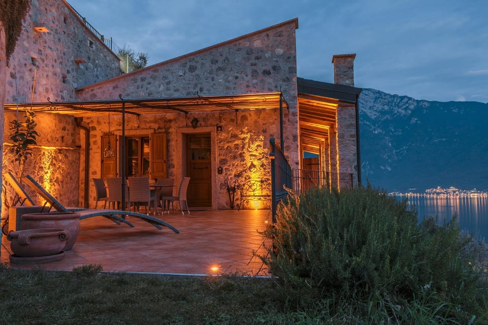 Property building, Patio, Night, Natural landscape, Lake view, Mountain view
