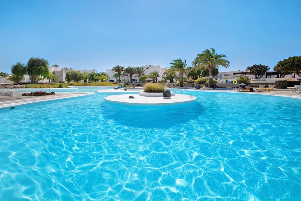 Property building, Living room, Swimming pool