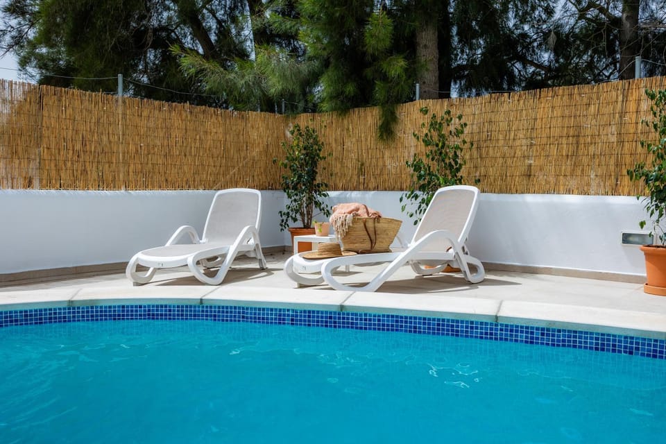 Property building, Living room, Swimming pool