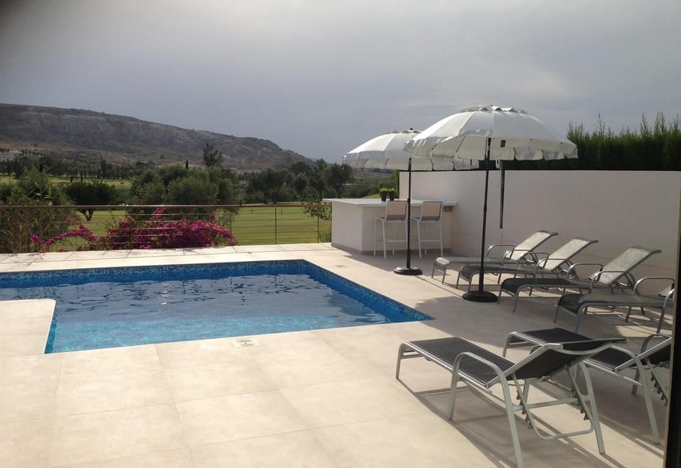 Property building, Living room, Swimming pool