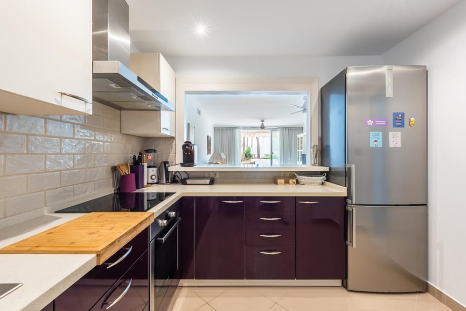 Kitchen or kitchenette, dishwasher, oven, stove