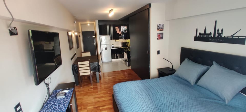 Bed, TV and multimedia, Living room, Photo of the whole room, Seating area, Dining area, Bedroom