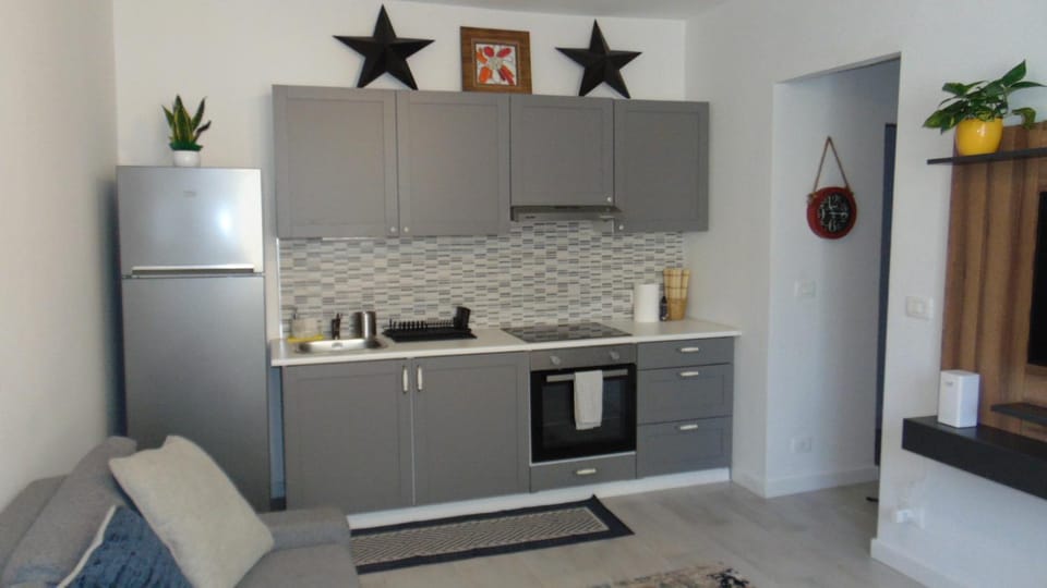 Kitchen or kitchenette, oven, stove
