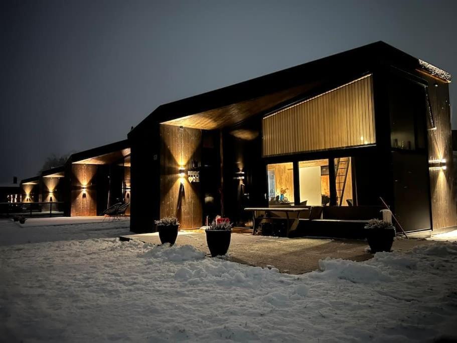 Attraktiv & smart funkishytte på Nes Strandhager. House in Viken, Norway