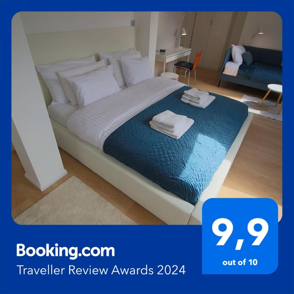 Bed, Photo of the whole room, Logo/Certificate/Sign, Bedroom, Certificate/Award, towels