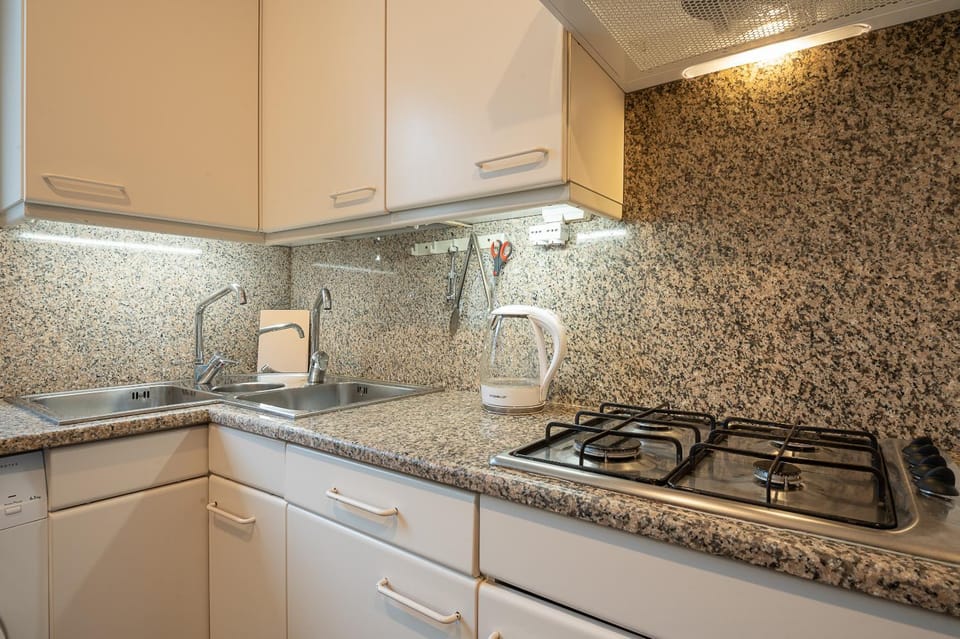 Kitchen or kitchenette, stove