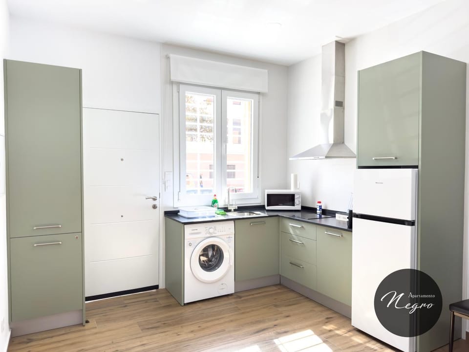 Kitchen or kitchenette, minibar, stove, washing machine, kitchen