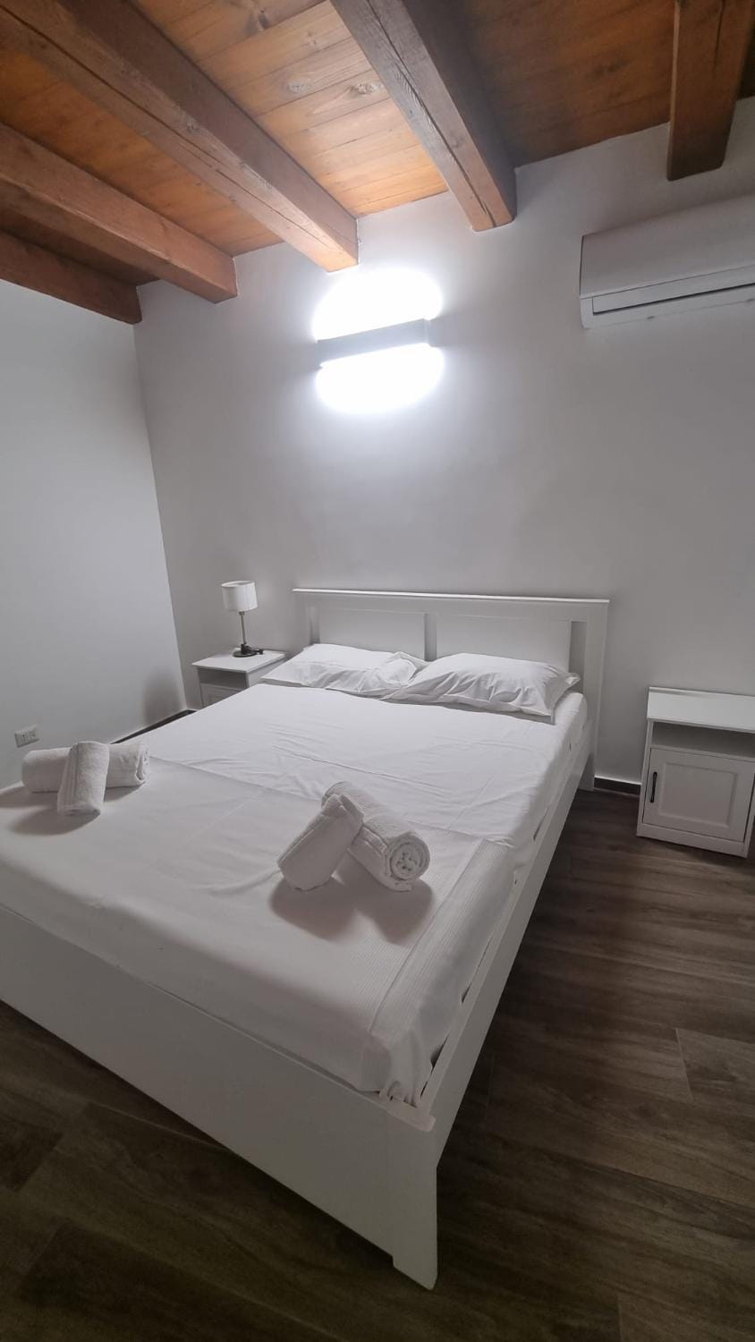 Bed, Photo of the whole room, Bedroom, towels, air conditioner