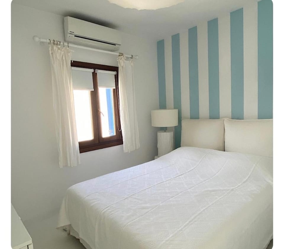 White luxury suite with shared pool downtown by Mykonos Eight Apartment in Mykonos