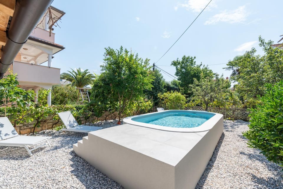 Natural landscape, Garden, Garden view, Pool view, Swimming pool, sunbed