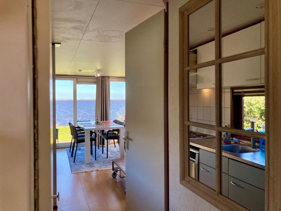 Waterfront holiday home Sonnenschein 4 persons with sauna Chalet in Anjum