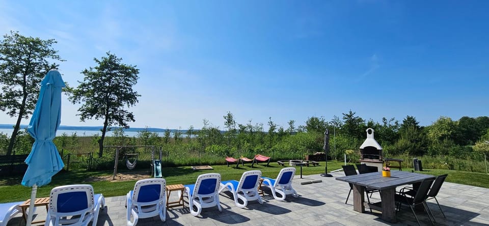 Villa Koprowo - mit direktem Seezugang, Sauna & Whirlpool Villa in West Pomeranian Voivodeship, Poland