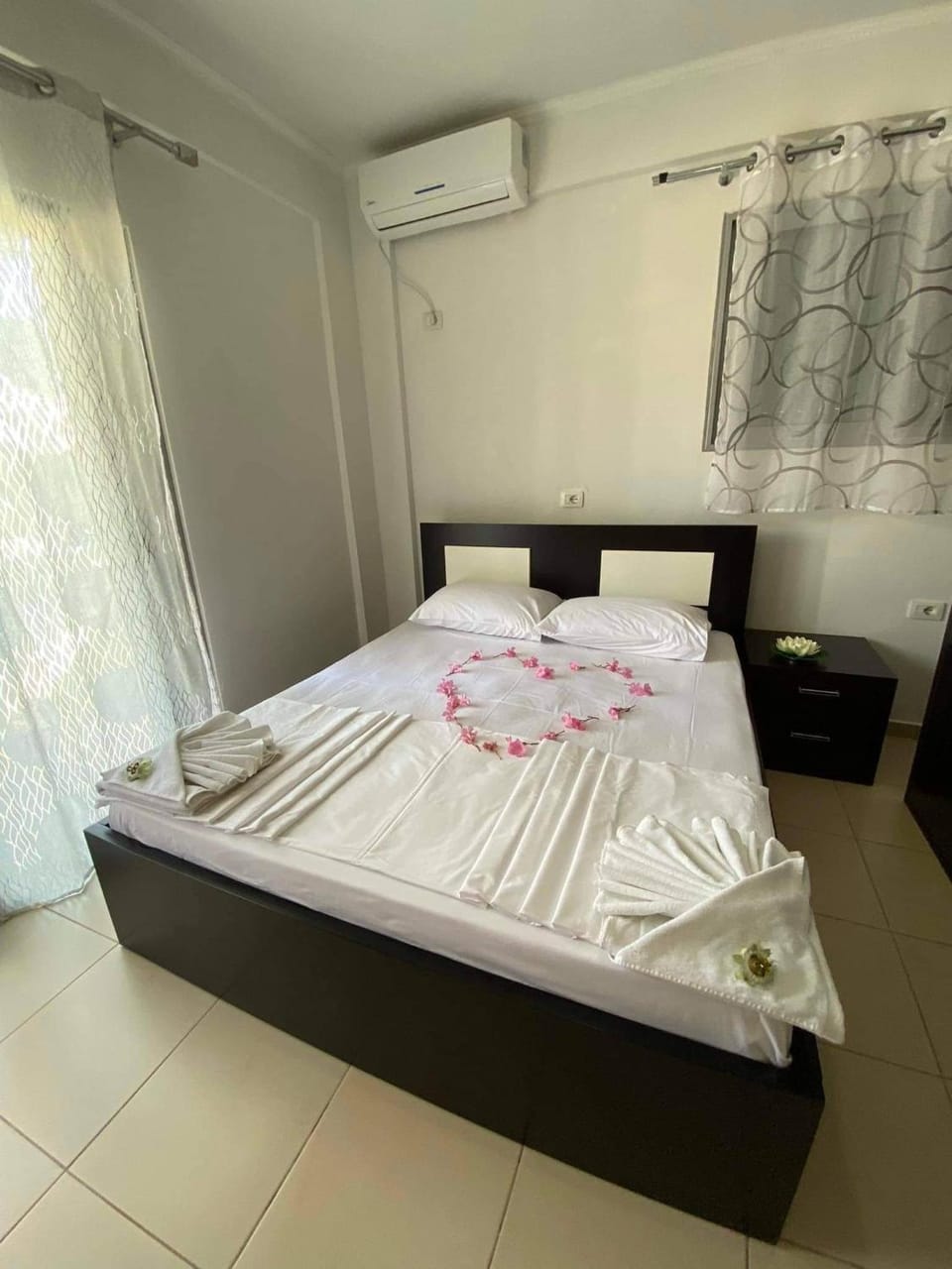 Bed, Photo of the whole room, Bedroom, towels, air conditioner