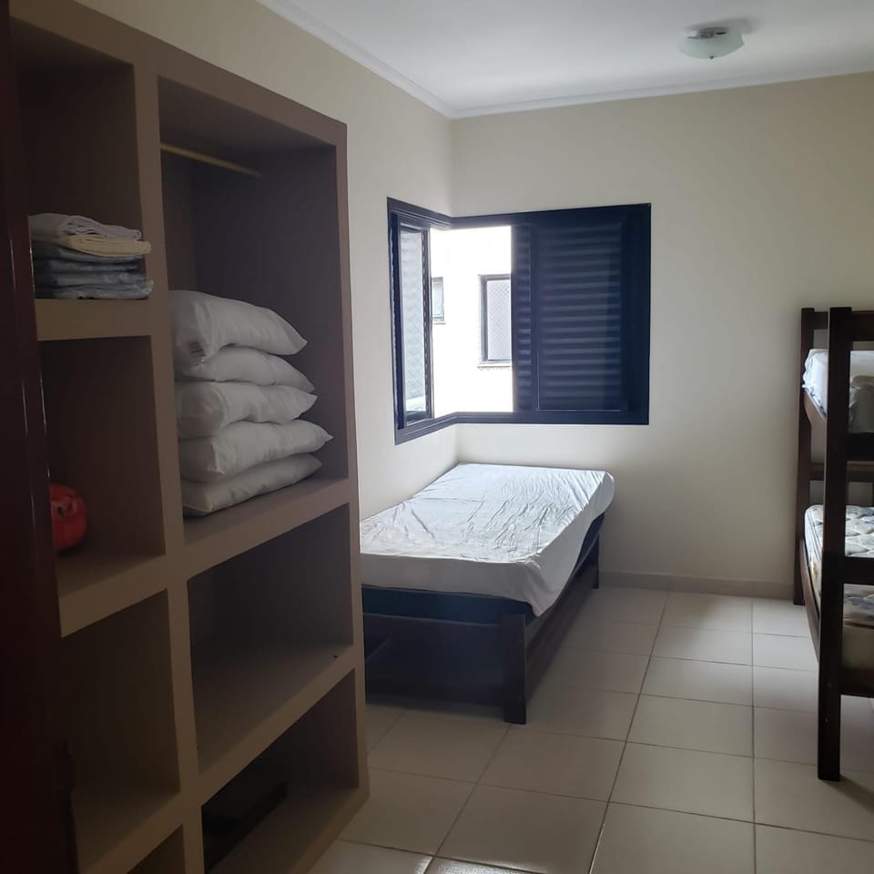 bunk bed, towels, wardrobe
