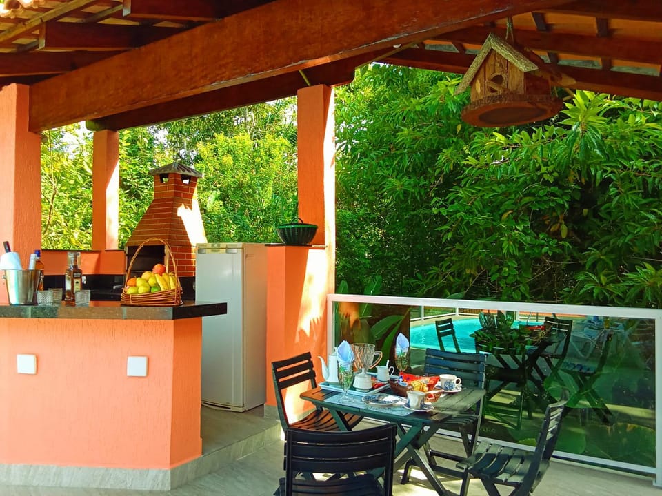 Casa de Praia Massaguaçu! Ao meio Áreas Arborizadas House in Caraguatatuba