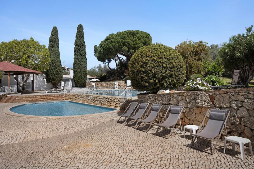 Property building, Living room, Swimming pool