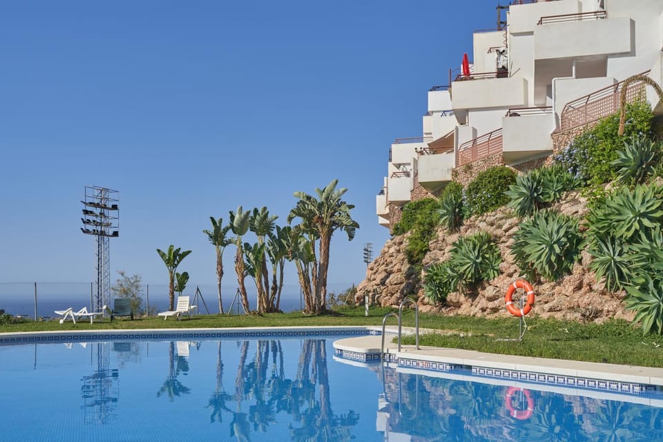 Property building, Living room, Swimming pool